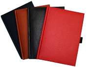 navy, tan, black and red bound journals