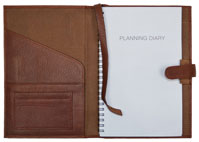 British tan leather journal with wirebound weekly monthly planner