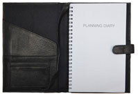 black leather planner with wirebound calendar insert